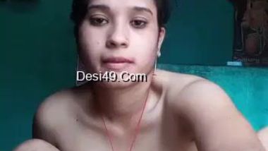 Village girl with hairy Desi pussy making XXX video posing nude