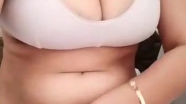 Indian slut has beautiful coconuts in big white bra and teases fans